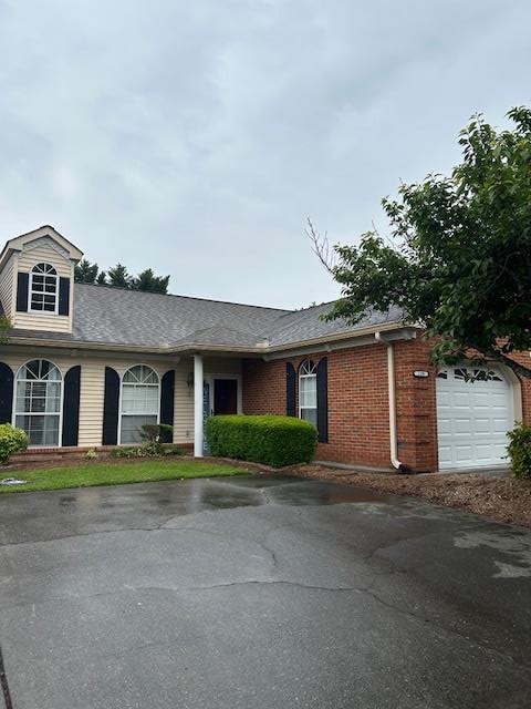 1698 Pin Oak Dr Unit 128, Dalton, GA 30721 - ranch-style house featuring brick siding, a garage, and asphalt driveway