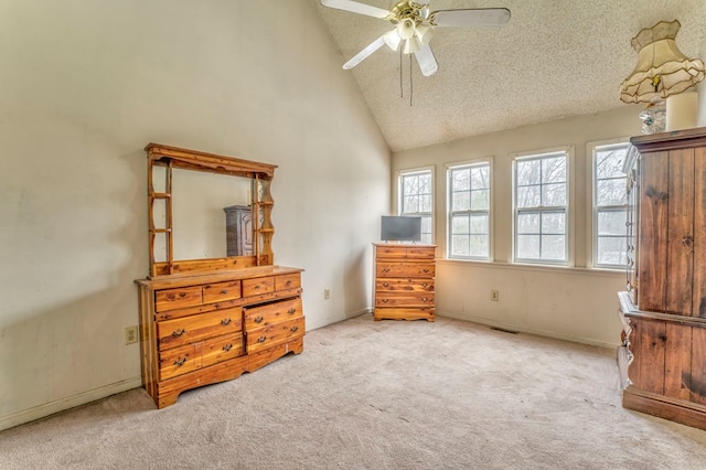 bedroom featuring high vaulted ceiling, carpet, visible vents, and a textured ceiling