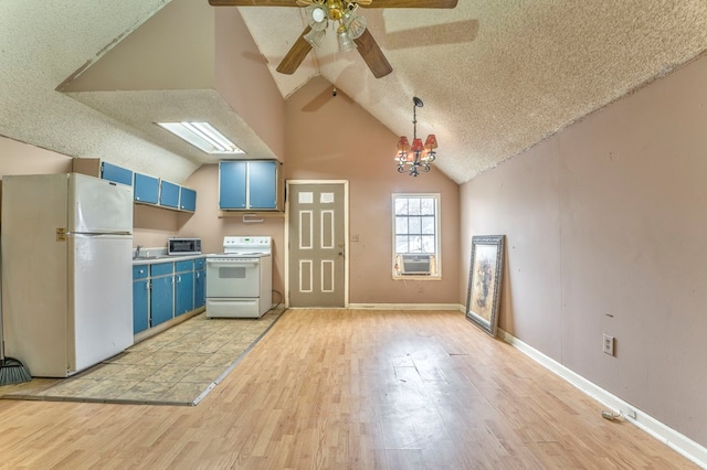 kitchen featuring white appliances, blue cabinets, light wood finished floors, and a textured ceiling