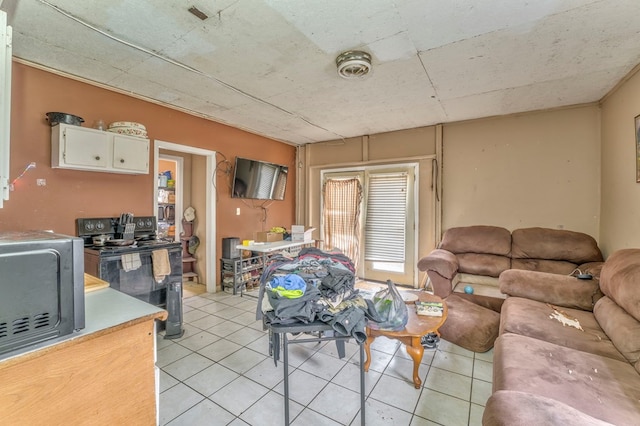 living room with light tile patterned floors