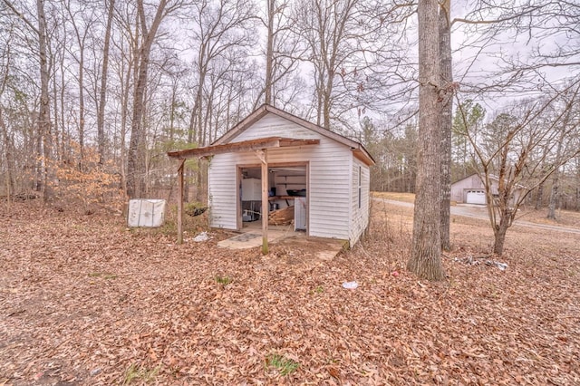 view of outbuilding with an outdoor structure