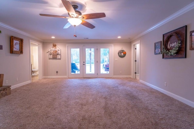unfurnished living room with baseboards, carpet flooring, ornamental molding, and ceiling fan