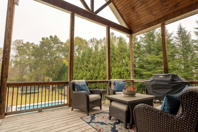 sunroom with vaulted ceiling