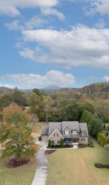 aerial view with a wooded view