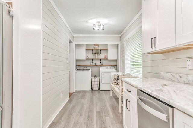 3012 Brookhaven Cir, Dalton, GA 30720 - kitchen with stainless steel dishwasher, open shelves, crown molding, washing machine and dryer, and wooden walls
