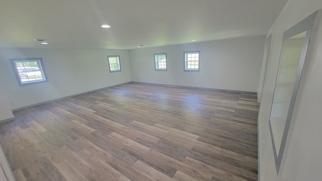 unfurnished room with light hardwood / wood-style floors