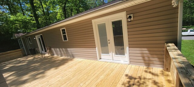 wooden terrace featuring french doors