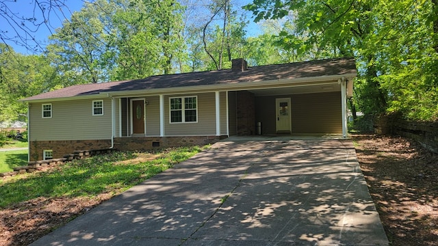 ranch-style home with a carport