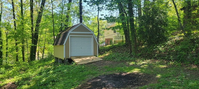 view of outbuilding with a garage