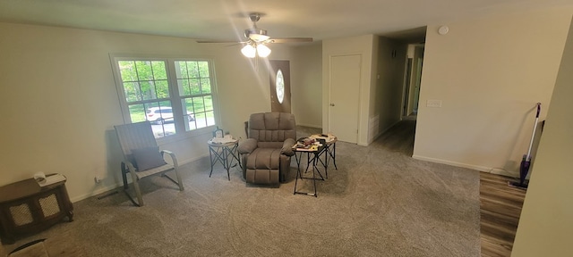 sitting room with ceiling fan