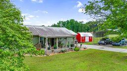 4223 Spring Valley Dr, Cohutta, GA 30710 - view of front facade with a front yard and driveway