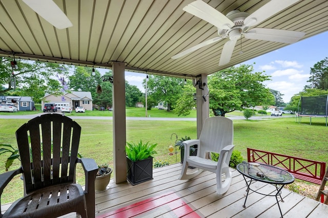 4223 Spring Valley Dr, Cohutta, GA 30710 - wooden terrace featuring a trampoline, ceiling fan, and a yard