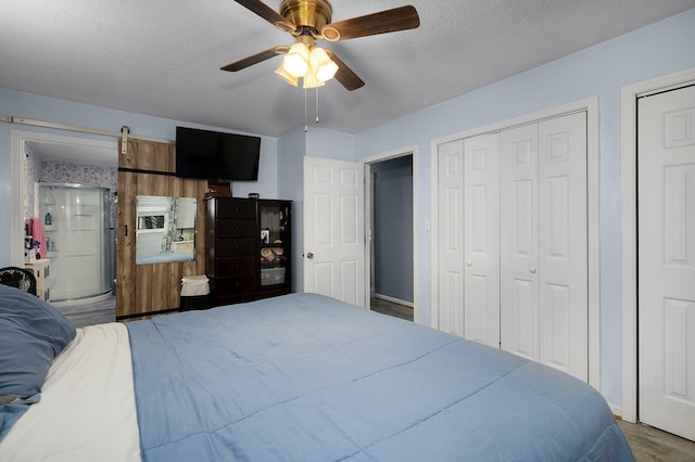 4223 Spring Valley Dr, Cohutta, GA 30710 - bedroom with a textured ceiling, ceiling fan, and wood finished floors