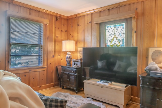 702 Lumpkin St, Dalton, GA 30720 - living room with light wood-type flooring, baseboards, and wood walls