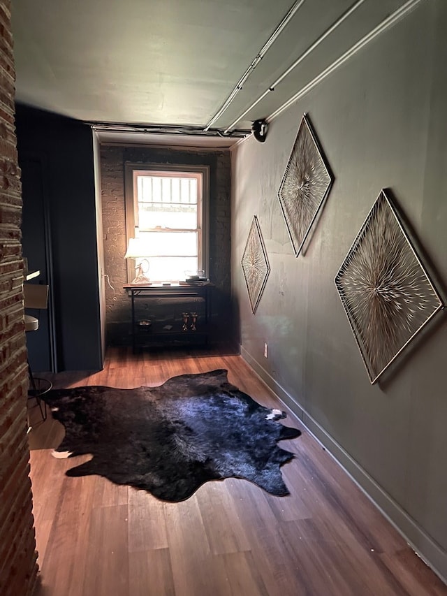 hallway featuring wood-type flooring