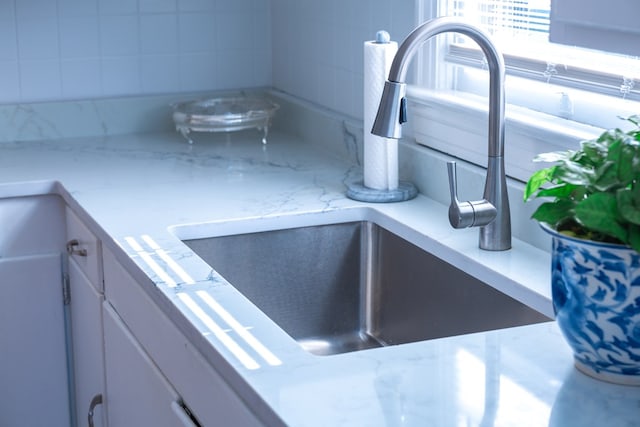 702 Lumpkin St, Dalton, GA 30720 - kitchen view of a sink and white cabinetry
