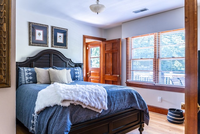 702 Lumpkin St, Dalton, GA 30720 - bedroom with wood finished floors and baseboards