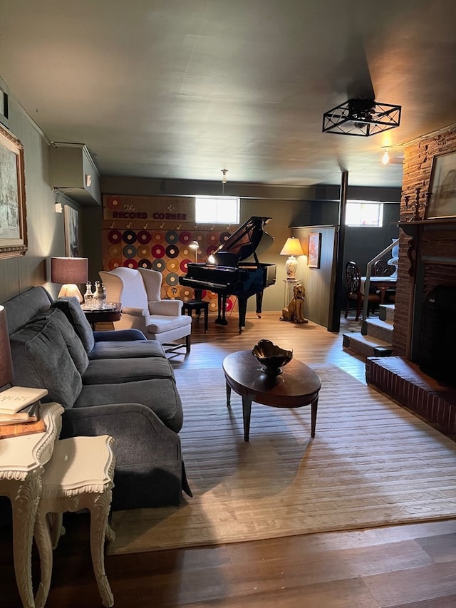 living room featuring hardwood / wood-style floors and a fireplace