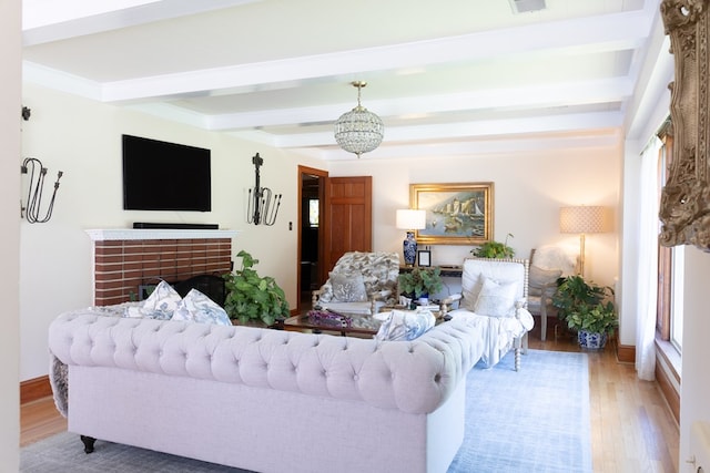 702 Lumpkin St, Dalton, GA 30720 - living room with light wood-style flooring, beamed ceiling, and baseboards