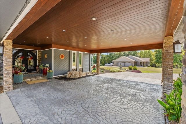 view of patio with a garage