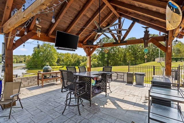 view of patio / terrace featuring a gazebo and ceiling fan