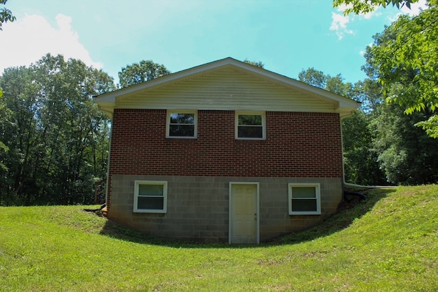 1722 Ball Ave, Dalton, GA 30720 - view of side of home with a yard and brick siding