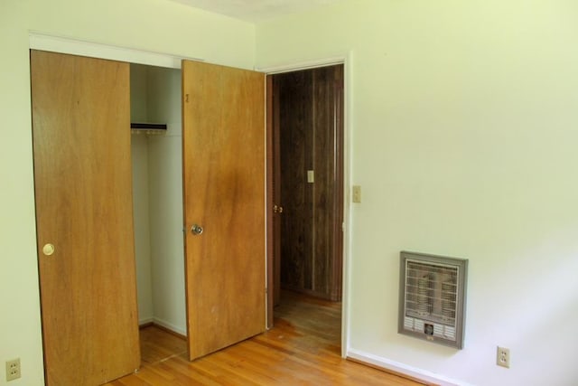 1722 Ball Ave, Dalton, GA 30720 - unfurnished bedroom featuring light wood-style flooring, a closet, and baseboards