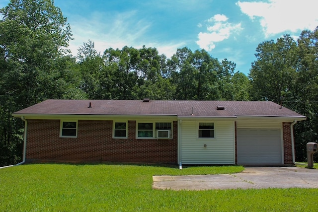 1722 Ball Ave, Dalton, GA 30720 - view of front facade with a garage, concrete driveway, a front yard, and brick siding