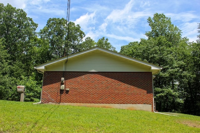 1722 Ball Ave, Dalton, GA 30720 - view of side of property featuring a lawn and brick siding