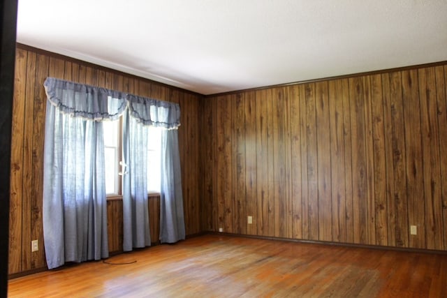 1722 Ball Ave, Dalton, GA 30720 - unfurnished room featuring light wood-style flooring and wooden walls