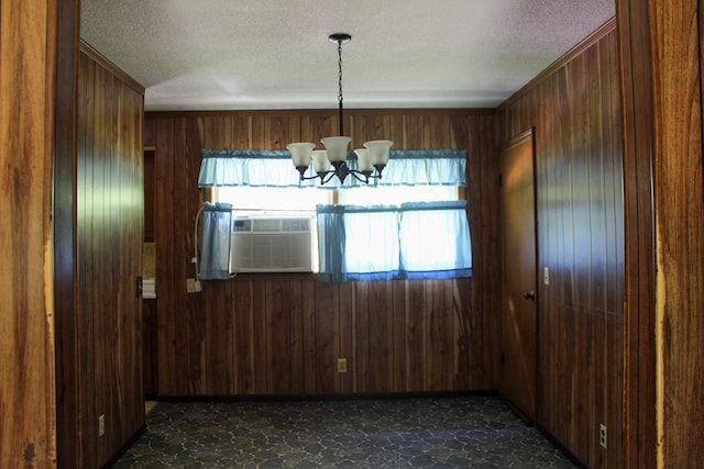 1722 Ball Ave, Dalton, GA 30720 - unfurnished dining area featuring healthy amount of natural light, a chandelier, cooling unit, wood walls, and a textured ceiling