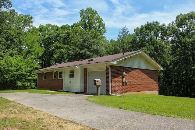 1722 Ball Ave, Dalton, GA 30720 - ranch-style home featuring an attached garage, brick siding, and a front lawn