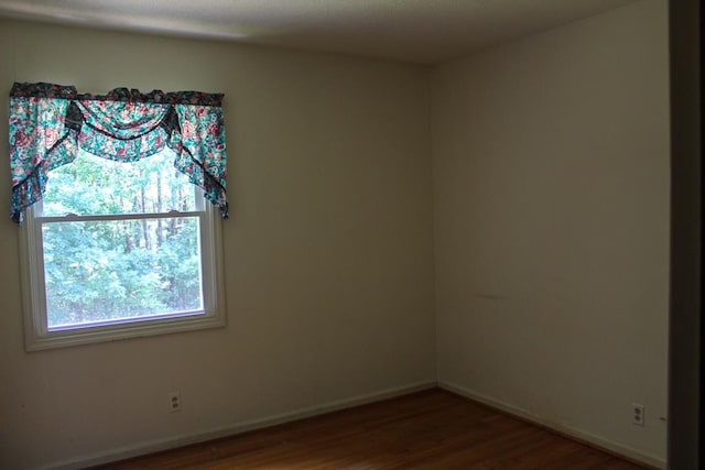 1722 Ball Ave, Dalton, GA 30720 - unfurnished room with wood finished floors and baseboards