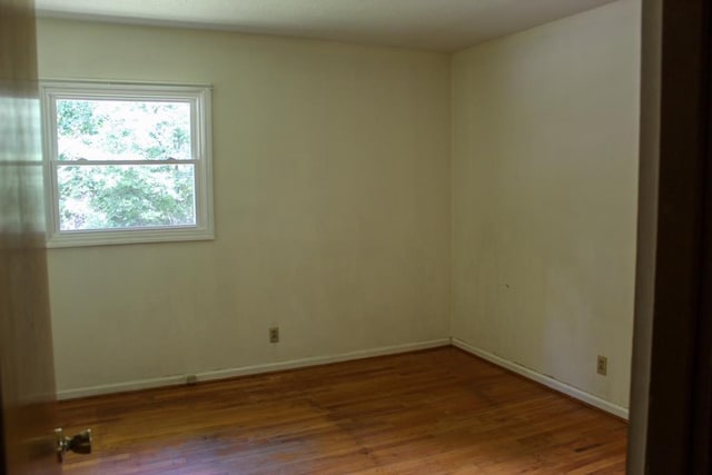 1722 Ball Ave, Dalton, GA 30720 - unfurnished room with wood finished floors and baseboards