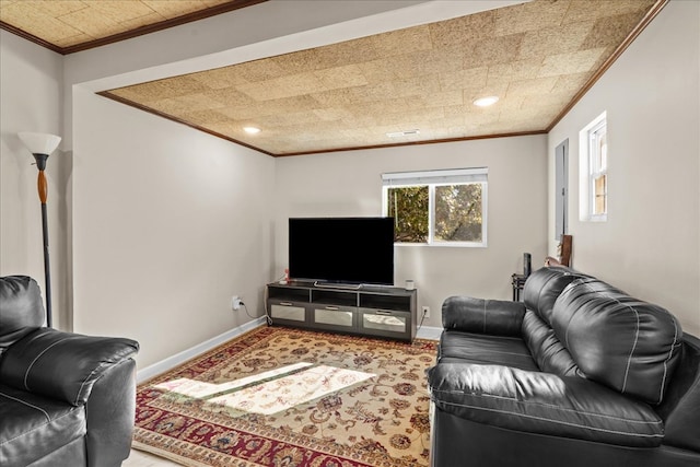 living room with recessed lighting, baseboards, and ornamental molding