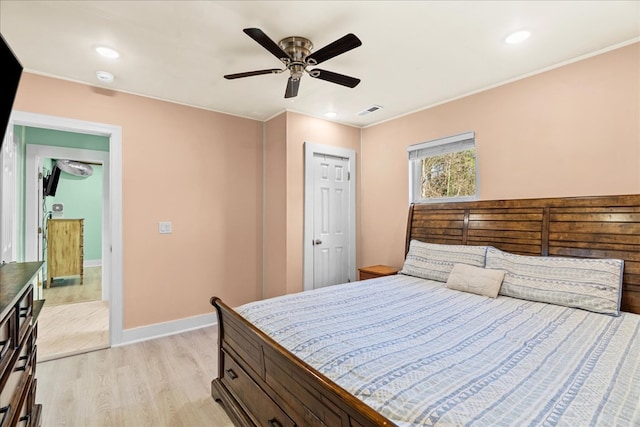 bedroom featuring recessed lighting, light wood-type flooring, baseboards, and visible vents