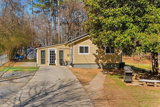 view of front of house with fence