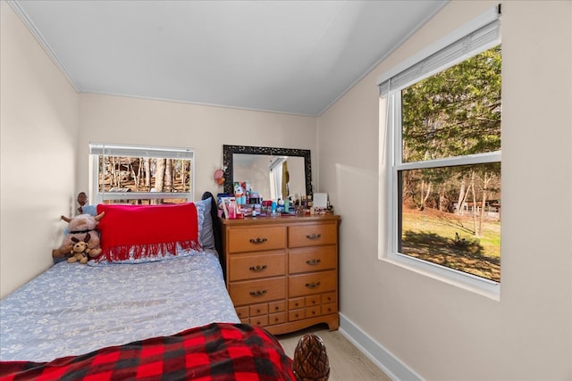 bedroom featuring baseboards