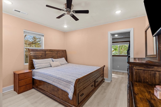 bedroom featuring recessed lighting, baseboards, visible vents, and light wood-type flooring