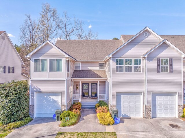 1521 Ashton Woods Way, Dalton, GA 30720 - traditional-style house with stone siding, driveway, a garage, and roof with shingles