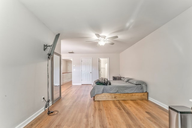 1521 Ashton Woods Way, Dalton, GA 30720 - bedroom with baseboards, ceiling fan, connected bathroom, and light wood finished floors