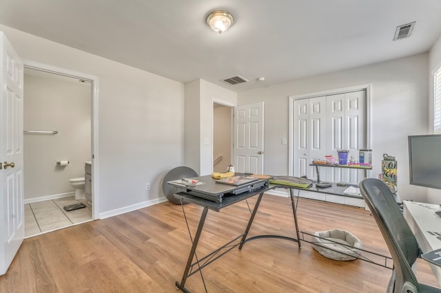 1521 Ashton Woods Way, Dalton, GA 30720 - home office featuring baseboards, visible vents, and light wood-style floors