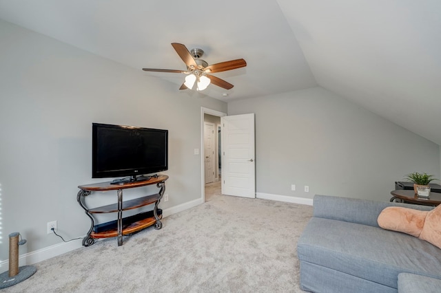 sitting room featuring vaulted ceiling, ceiling fan, and carpet flooring