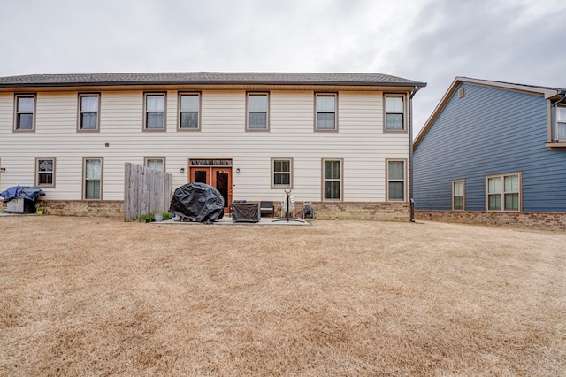 back of house with a patio