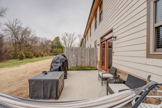 view of patio featuring a grill