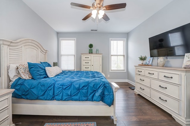 bedroom featuring dark hardwood / wood-style floors and ceiling fan