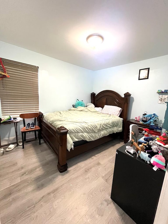 609 Charles St, Dalton, GA 30720 - bedroom with light wood-style flooring