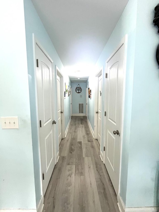 609 Charles St, Dalton, GA 30720 - hall featuring light wood-style floors and baseboards