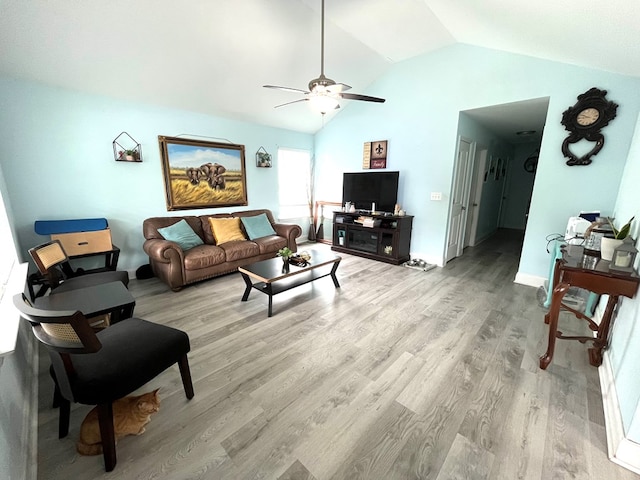 609 Charles St, Dalton, GA 30720 - living room featuring a ceiling fan, light wood finished floors, lofted ceiling, and baseboards