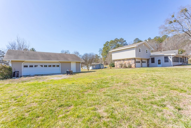 view of yard featuring a garage